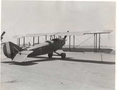 A Curtis JN-4 Trainer idles at Kelly field in 1917. The JN-4, known as the "Jenny," was the first plane to land at Kelly Field.
