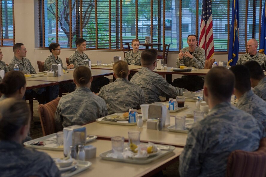 U.S. Air Force Maj. Gen. Scott Zobrist, 9th Air Force commander, and Chief Master Sgt. Frank Batten III, 9th Air Force command chief, speak with Airmen assigned to the 20th Fighter Wing during breakfast at the Chief Master Sgt. Emerson E. Williams Dining Facility at Shaw Air Force Base, S.C., March 31, 2017. Zobrist took the opportunity to encourage those Airmen involved in 