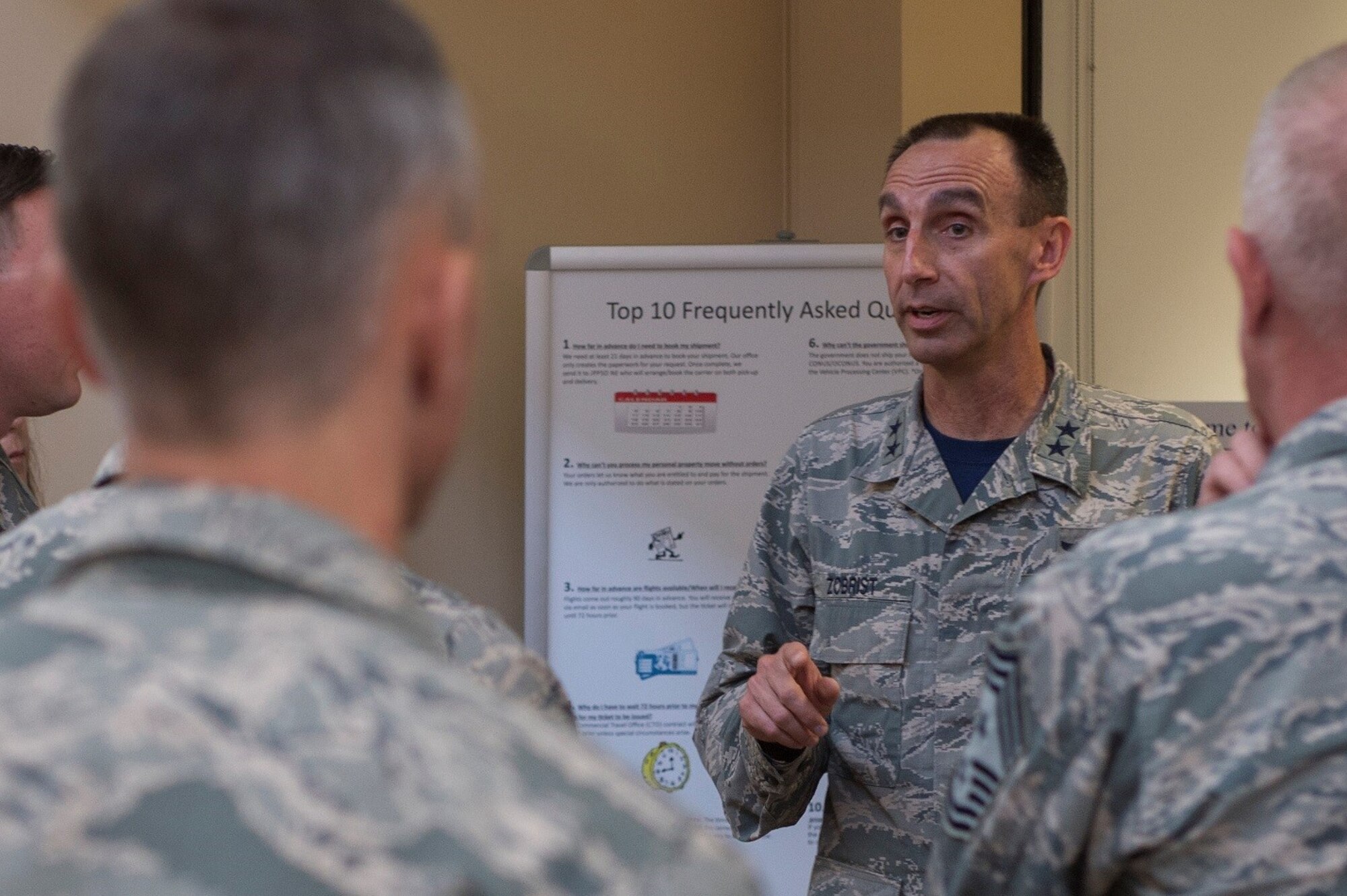 U.S. Air Force Maj. Gen. Scott Zobrist, 9th Air Force commander, speaks with Airmen from the 20th Logistics Readiness Squadron traffic management office about customer service at Shaw Air Force Base, S.C., March 31, 2017. Zobrist visited several agencies within the 20th Fighter Wing to increase understanding of the wing’s overall mission and encourage Airmen involved incustomer service to make it a higher priority in their day-to-day jobs. (U.S. Air Force photo by Senior Airman Zade Vadnais)