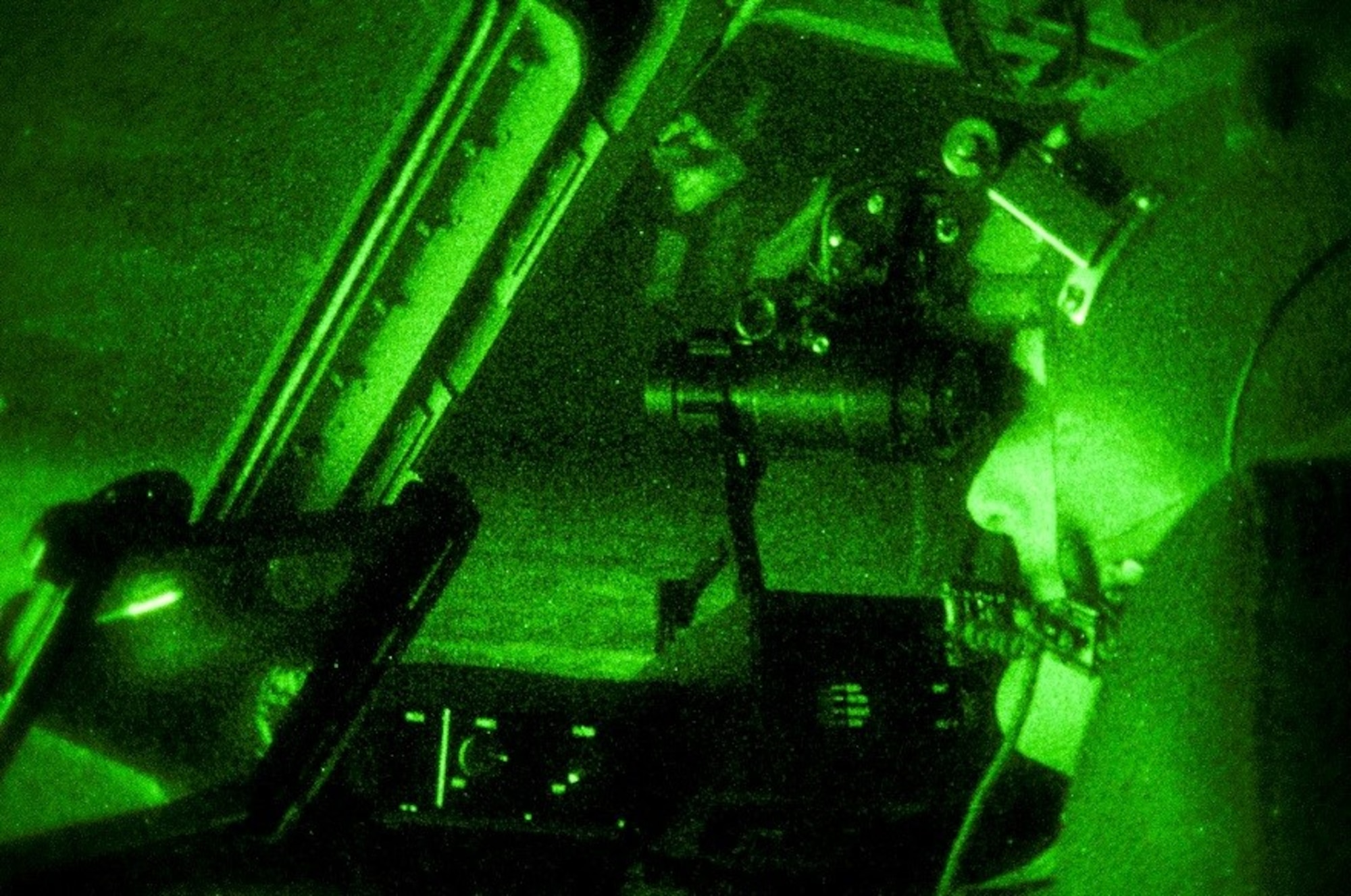 U.S. Air Force Capt. Andrew Rast, 304th Expeditionary Airlift Squadron pilot, uses night vision goggles to taxi a C-17 Globemaster III aircraft after landing at Pegasus Ice Runway, Antarctica during Operation Deep Freeze (ODF), July 15, 2016. ODF is the logistical support provided by the Department of Defense to the U.S. Antarctic Program (USAP). This includes the coordination of strategic inter-theater airlift, tactical intra-theater airlift and airdrop, and transportation requirements supporting the National Science Foundation, the lead agency for the USAP. (U.S. Air Force Reserve photo by Staff Sgt. Madelyn McCullough)