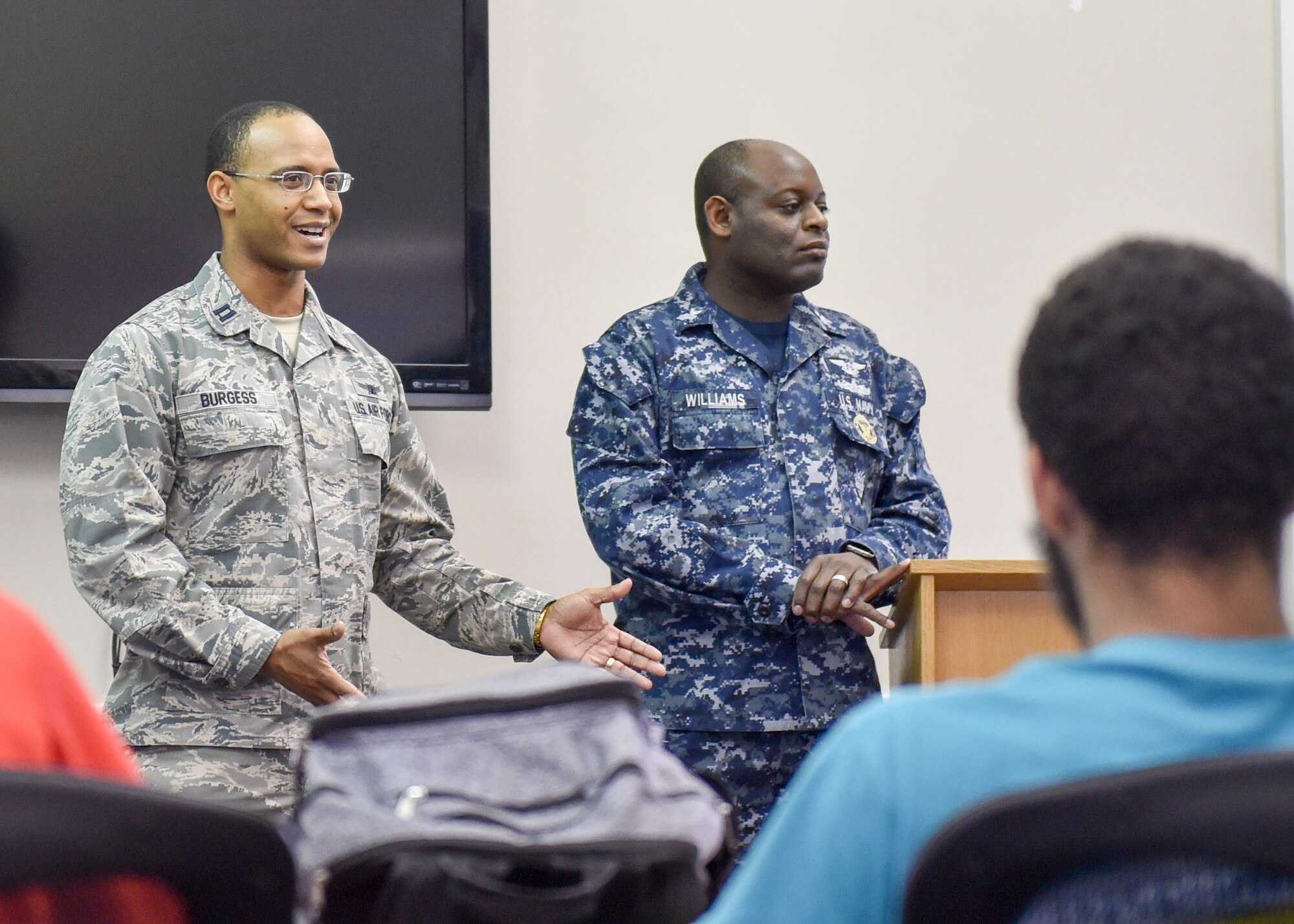 Capt. Anthony Burgess, an executive officer with the 910th Airlift Wing, introduces himself to approximately 25 students from the Inspiring Minds program who were here for a study and tutoring session April 13, 2017. Youngstown Air Reserve Station partners with Inspiring Minds, a non-profit K-12 youth organization based in Warren, Ohio, to provide mentorship and represent the Air Force Reserve as a career option. Volunteers from YARS devote personal time to mentorship, tutoring and fun activities with the students several times throughout the school year. (U.S. Air Force photo/Eric White)