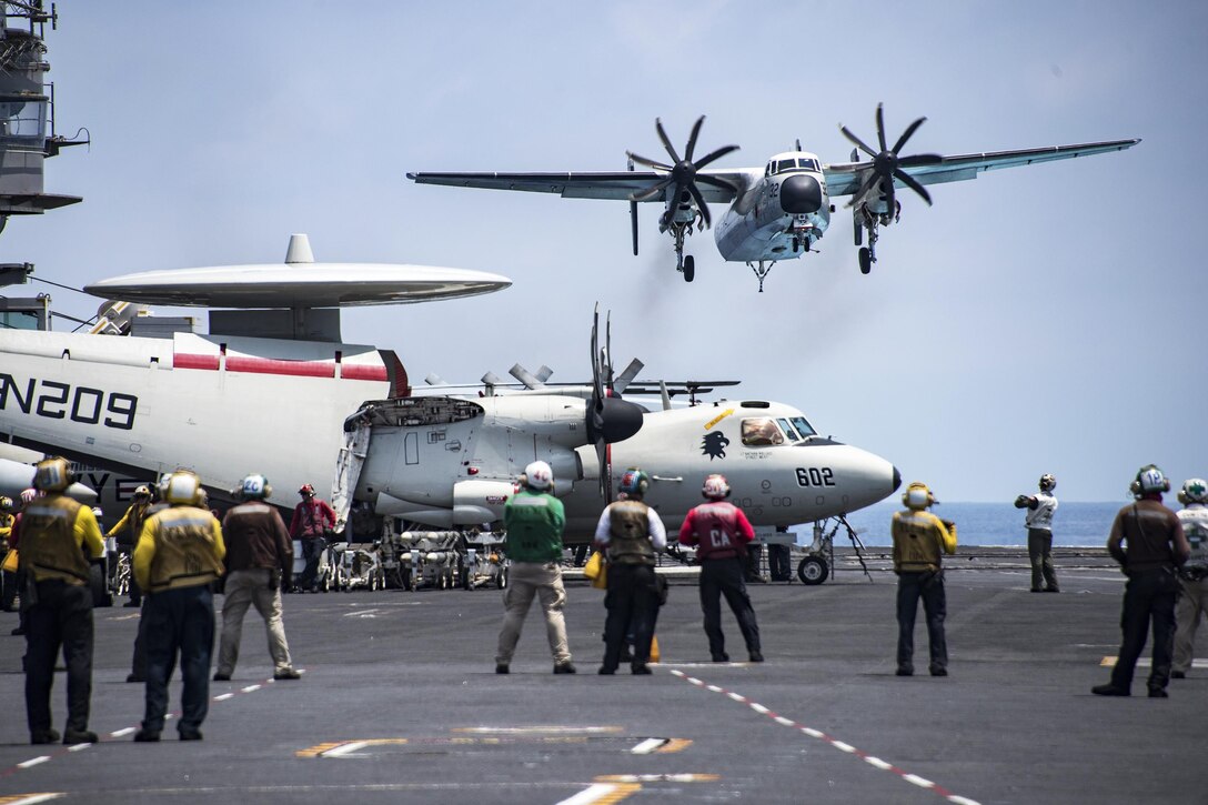 A C-2A Greyhound aircraft lands on the flight deck of the aircraft carrier USS Carl Vinson in the South China Sea, April 10, 2017. Navy photo by Petty Officer 2nd Class Sean M. Castellano