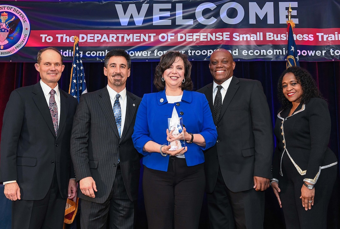 DLA Land and Maritime’s Small Business Office received the Verdure Award during the DoD's annual Vanguard Awards ceremony April 6 in Atlanta, GA for significant contributions to buying method efficiency and innovation. From left: Dr. James Galvin, acting director of DoD Office of Small Business Programs; Carlo Daleo, Land and Maritime procurement analyst; Coleen McCormick, Land and Maritime Office of Small Business Programs associate director; Earl Madison, Land and Maritime small business specialist; Alice Williams, DoD Office of Small Business Programs acting deputy director.