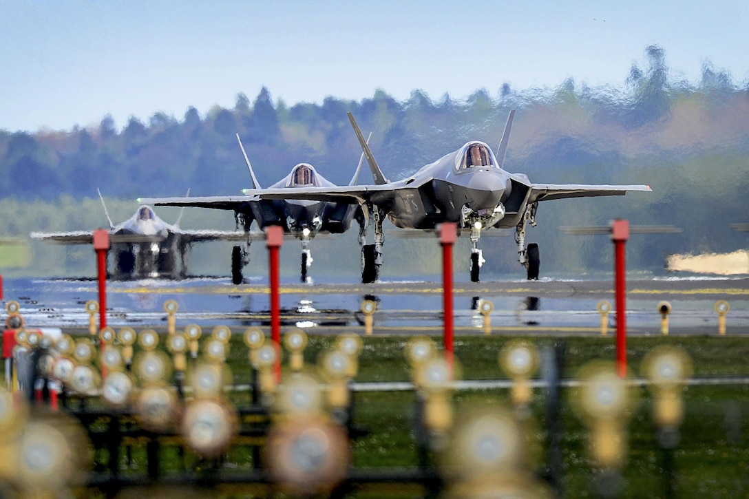 F-35A Lightning II joint strike fighters land at Royal Air Force Lakenheath, England, April 15, 2017. The aircraft arrival marks the first F-35A fighter training deployment to the U.S. European Command area of responsibility or any overseas location. The aircraft are assigned to the 34th Fighter Squadron at Hill Air Force Base, Utah. Air Force photo by Tech. Sgt. Matthew Plew