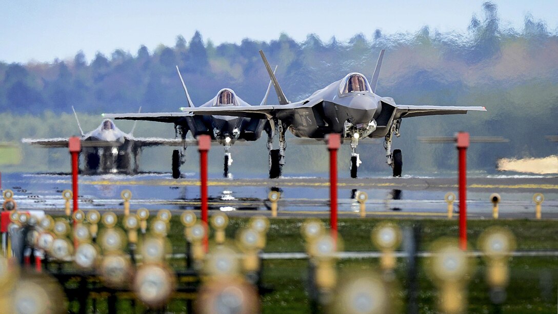 F-35A Lightning II joint strike fighters land at Royal Air Force Lakenheath, England, April 15, 2017. The aircraft arrival marks the first F-35A fighter training deployment to the U.S. European Command area of responsibility or any overseas location. The aircraft are assigned to the 34th Fighter Squadron at Hill Air Force Base, Utah. Air Force photo by Tech. Sgt. Matthew Plew