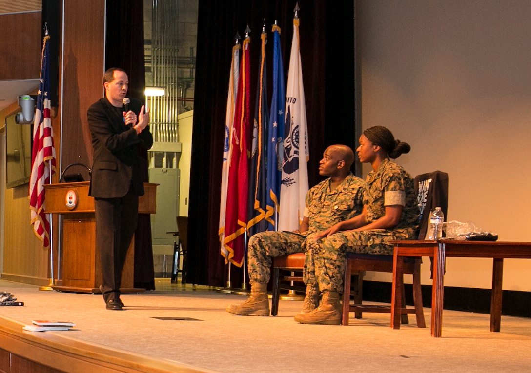 Mike Domitzr, left, an author and sexual assault spokesman, stands alongside two Marines participating in a scenario during his “Can I Kiss you?” class, April 12, aboard Naval Support Activity Hampton Roads, Va. The class took place in support of Sexual Assault Awareness and Prevention Month for Marines, sailors and civilians of Hampton Roads. (U.S. Marine Corps photo by Sgt. Kayla D. Rivera/Released)