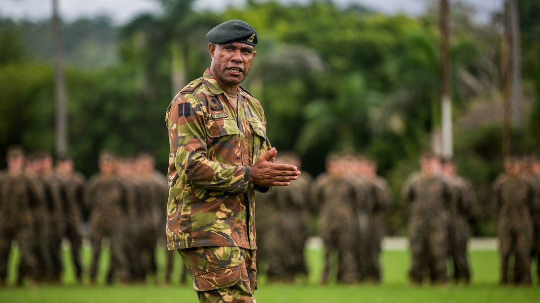 Lt. Col. Boniface Aruma, a company commander with Royal Pacific Island Regiments, Papua New Guinea Defense Force, speaks to U.S. Marines with the 11th Marine Expeditionary Unit and service members with the PNGDF during the opening ceremony of a bilateral training exercise at Taurama Barracks, held as part of a theater security cooperation engagement, April 15. The TSC is the second major engagement between two nations, following Exercise Koa Moana 2016, where U.S. Marines worked alongside the PNGDF in a series of bilateral training activities.