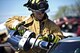 Robert Jacobs, Grissom firefighter, cuts into the frame of a car during extrication training in Peru, Indiana, April 12, 2017. The Grissom fire department has an immediate response area around the base which can be extended if the emergency warrants it. (U.S. Air Force photo/Senior Airman Harrison Withrow)