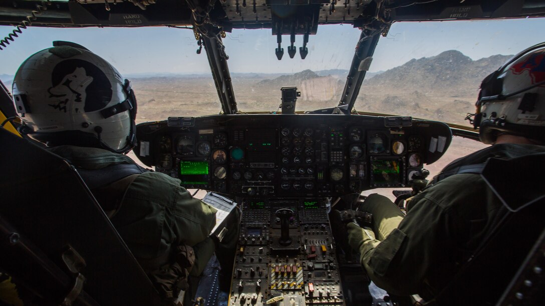 Marine Corps pilots with Marine Heavy Helicopter Squadron 466, take part in a tactical support insert and extract exercise during Weapons and Tactics Instructors course 2-17 at Naval Air Facility El Centro, Calif., April 15, 2017. WTI is held biannually at Marine Corps Air Station Yuma, Ariz. to provide students with detailed training to be practiced on the various ranges in Arizona and California.