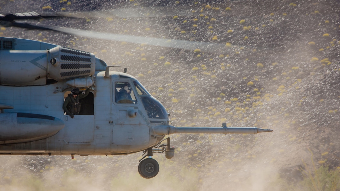 A CH-53E Super Stallion assigned to Marine Heavy Helicopter Squadron 466 takes off during a tactical support insert and extract exercise in part of Weapons and Tactics Instructors course 2-17 at Naval Air Facility El Centro, Calif., April 15, 2017. WTI is held biannually at Marine Corps Air Station Yuma, Ariz. to provide students with detailed training to be practiced on the various ranges in Arizona and California.
