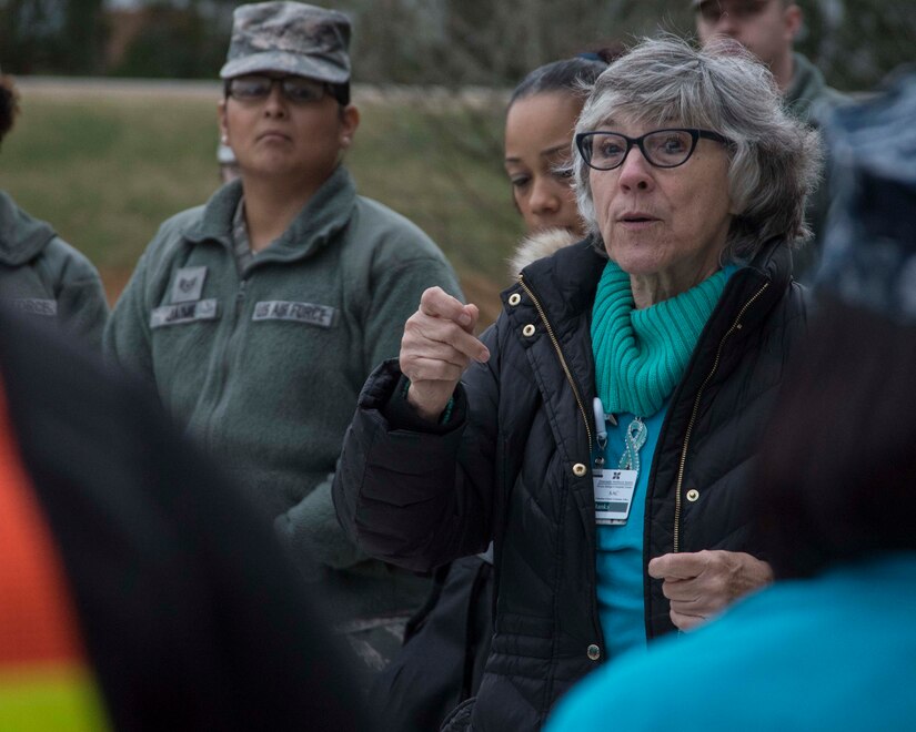 Cheryl Banks, Prince George’s Hospital Center sexual assault nurse examiner, informs “Walk in My Boots” participants at Joint Base Andrews, Md., April 7, 2017 about procedures to take when someone is sexually assaulted. The reflective walk was one of multiple Sexual Assault Awareness and Prevention Month events meant to raise cognizance about sexual harassment and violence, and inform military members about how to prevent it. (U.S. Air Force photo by Senior Airman Jordyn Fetter) 