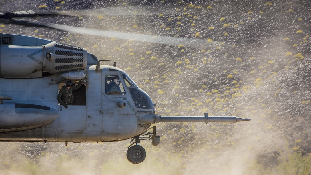A CH-53E Super Stallion takes off during a tactical support insert and extract exercise as part of a weapons and tactics course at Naval Air Facility El Centro, Calif., April 15, 2017. The biannually course provides students with detailed training to be practiced on the various ranges in Arizona and California.The Stallion is assigned to Marine Heavy Helicopter Squadron 466. Marine Corps photo by Cpl. Trever Statz