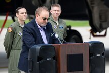 Mr. Jeff Thatcher, son of the World War II era Ruptured Duck’s flight engineer, Staff Sgt. Jeff Thatcher, shares memories his father passed on to him before his passing during an unveiling ceremony for the new Ruptured Duck artwork, Apr. 17, 2017 at Wright-Patterson Air Force Base, Ohio. In addition to the unveiling, the B-1 aircraft was also christened by the Thatcher family. (U.S. Air Force photo by Wesley Farnsworth)