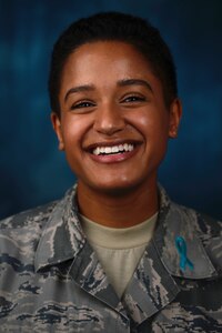 A U.S. Air Force Airman poses for a photo to show her support for Sexual Assault Awareness and Prevention Month at Joint Base Langley-Eustis, Va., March 28, 2017. The Airman aspires, through her experience, to change the way people view sexual assault from victims and survivors. (U.S. Air Force photo/Airman 1st Class Kaylee Dubois)