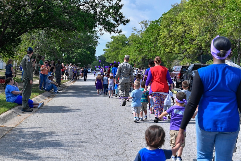 Parents clap as their children pass by during a parade here for Month of the Military Child, April 14, 2017. April is designated as Month of the Military Child to recognize the 1.7 million military children across the globe and the sacrifices they make alongside their parents.