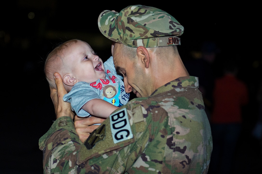 Air Force Staff Sgt. Jonathan Jenkins plays with his son before deploying from Moody Air force Base, Ga., April 11, 2017. Jenkins is a squad leader assigned to the 824th Base Defense Squadron. More than 100 airmen from the unit deployed to Southwest Asia to provide fully-integrated, highly capable and responsive forces. Air Force photo by Airman 1st Class Greg Nash