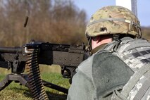 A security forces specialist assigned to the 180th Fighter Wing, Ohio Air National Guard, fires crew-served weapon April 12, 2017, at the Fort Custer Training Center in Battle Creek, Michigan. Continuous training keeps Airmen ready to deploy and allows the to be the most lethal choice for the combatant commander, increasing overall force capability. (U.S. Air National Guard photo by Staff Sgt. Shane Hughes)