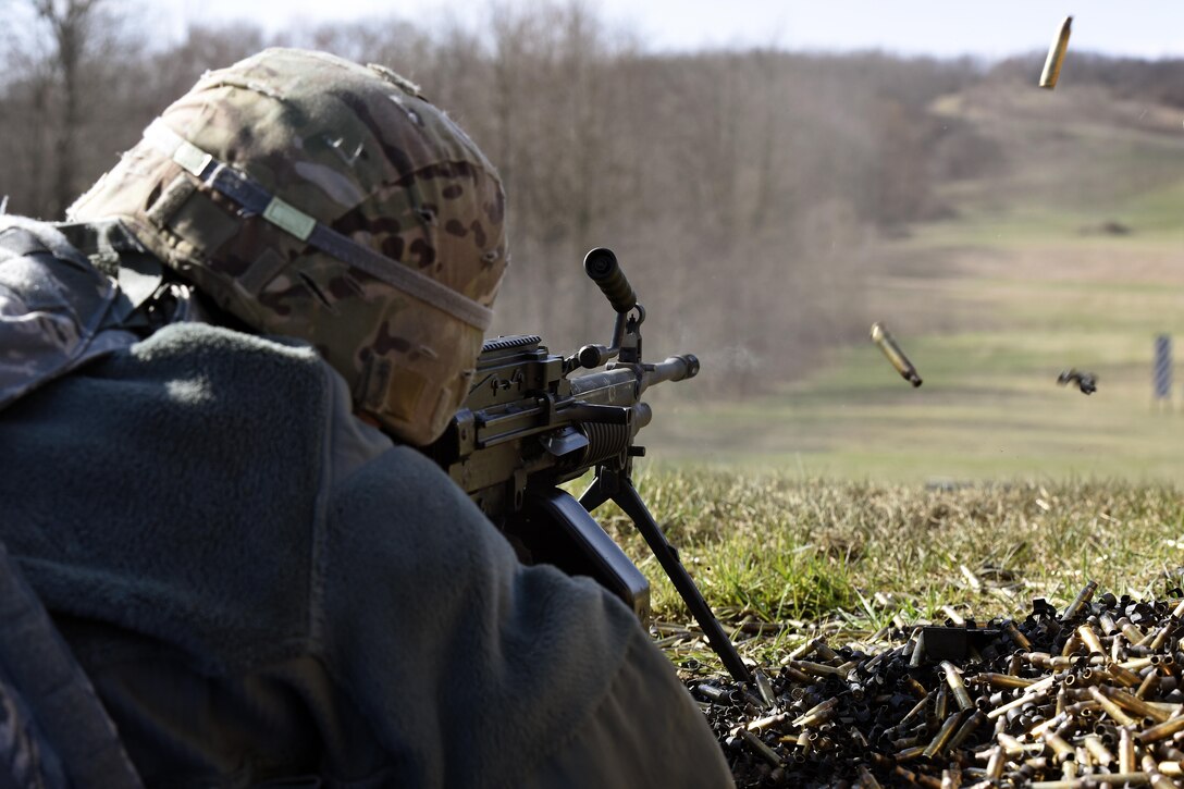 A security forces specialist assigned to the 180th Fighter Wing, Ohio Air National Guard, fires crew-served weapon April 12, 2017, at the Fort Custer Training Center in Battle Creek, Michigan. Continuous training keeps Airmen ready to deploy and allows the to be the most lethal choice for the combatant commander, increasing overall force capability. (U.S. Air National Guard photo by Staff Sgt. Shane Hughes)