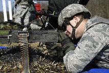 U.S. Air Force Senior Airman Benton Pohlman, a security forces specialist assigned to the 180th Fighter Wing, Ohio Air National Guard, fires a crew-served weapon April 12, 2017 at the Fort Custer Training Center in Battle Creek, Michigan. Weapons training allows Airmen to provide protection of the homeland and effective combat power to their combatant commander. (U.S. Air National Guard photo by Staff Sgt. Shane Hughes)