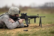 U.S. Air Force Senior Airman Benton Pohlman, a security forces specialist assigned to the 180th Fighter Wing, Ohio Air National Guard, fires an M4 carbine rifle during target practice April 12, 2017 at the Fort Custer Training Center in Battle Creek, Michigan. Weapons training allows Airmen to provide protection of the homeland and effective combat power to their combatant commander. (U.S. Air National Guard photo by Staff Sgt. Shane Hughes)