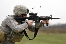 U.S. Air Force Senior Airman Benton Pohlman, a security forces specialist assigned to the 180th Fighter Wing, Ohio Air National Guard, fires an M4 carbine rifle during target practice April 12, 2017 at the Fort Custer Training Center in Battle Creek, Michigan. Weapons training allows Airmen to provide protection of the homeland and effective combat power to their combatant commander. (U.S. Air National Guard photo by Staff Sgt. Shane Hughes)