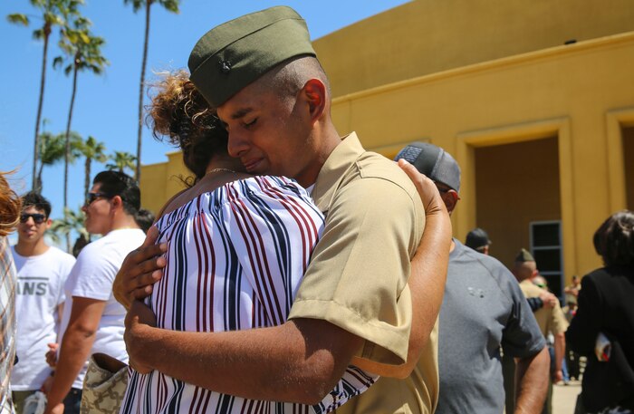 The new Marines of Golf Company, 2nd Recruit Training Battalion, embrace their loved ones during liberty call at Marine Corps Recruit Depot San Diego, today.
After nearly thirteen weeks of training, the Marines of Golf Company will officially graduate from recruit training tomorrow.
