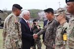 U.S. Vice President Michael R. Pence shakes hands with South Korean Gen. Leem Ho-Young, deputy commanding general of Combined Forces Command, near the demilitarized zone in South Korea, April 17, 2017. Pence is making his first trip to South Korea in order to receive a strategic overview of the peninsula. 