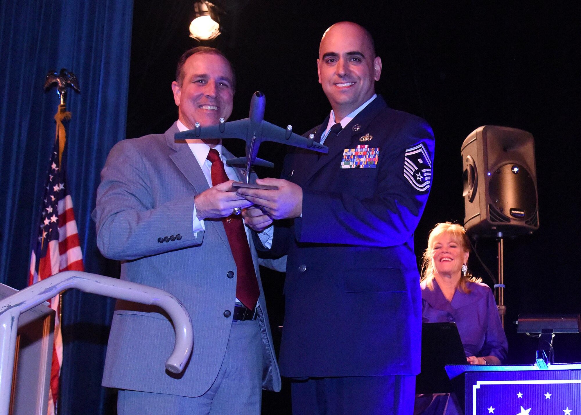 Senior Master Sgt. Paul Sety, 141st Logistics Readiness Squadron first sergeant, receives the Senior Non-Commissioned Officer of the Year Award from the West Plains Chamber of Commerce at the Best of the West Awards Gala April 14 in Airway Heights, Wash. The event recognized outstanding contributions to the local community. (U.S. Air Force photo/Staff Sgt. Samantha Krolikowski)
