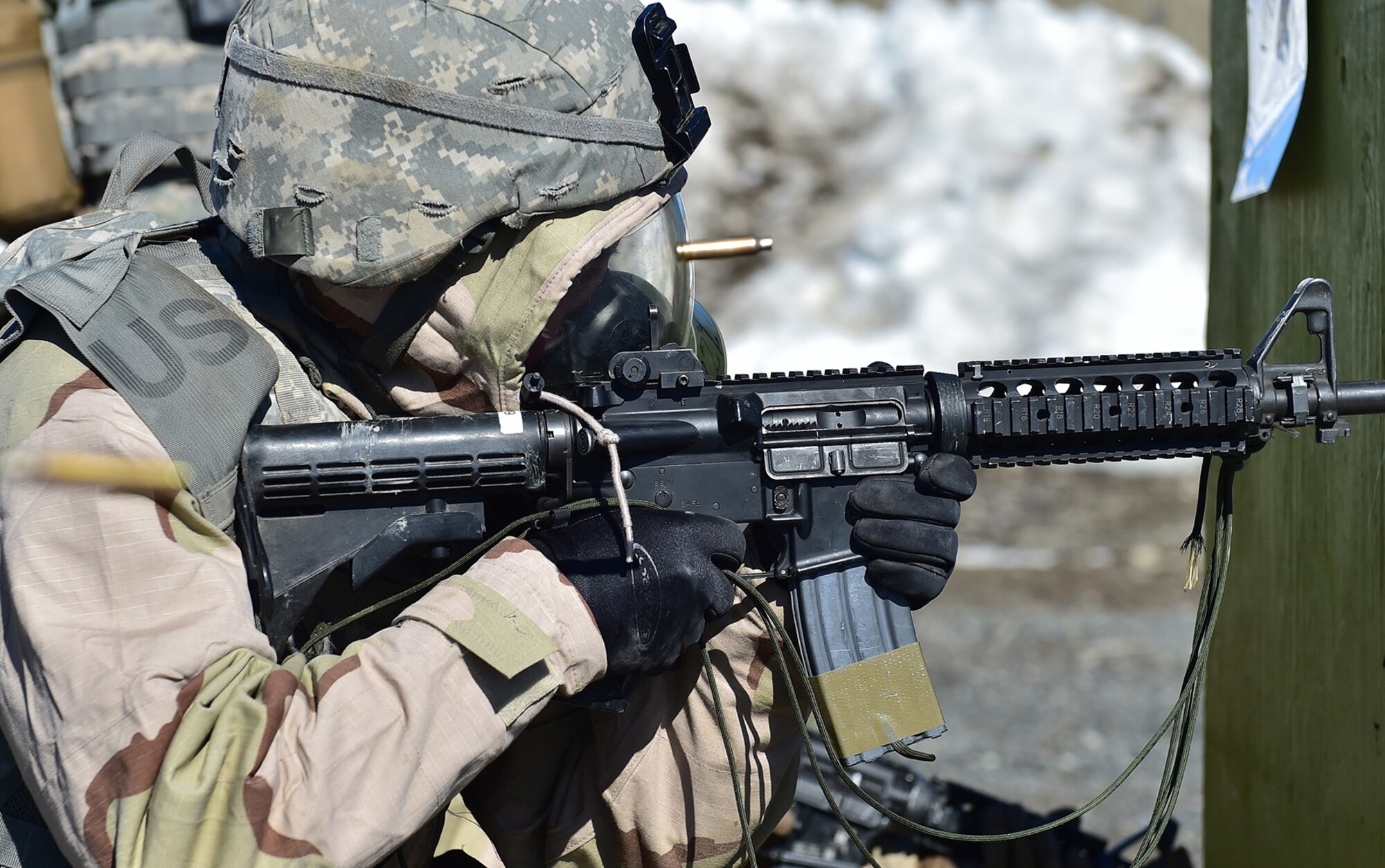 Spc. Katie McCarthy, a native of Punta Gorda, Fla., assigned to the 95th Chemical Company, “Arctic Dragons”, 17th Combat Sustainment Support Battalion, U.S. Army Alaska, executes a Joint Service Lightweight Integrated Suit Technology stress fire at McGee range on Joint Base Elmendorf-Richardson, Alaska, April 13, 2017. The JSLIST is the product of a four-Service effort to field a common chemical protective clothing ensemble including a lightweight protective garment, multi-purpose overboots and gloves. 