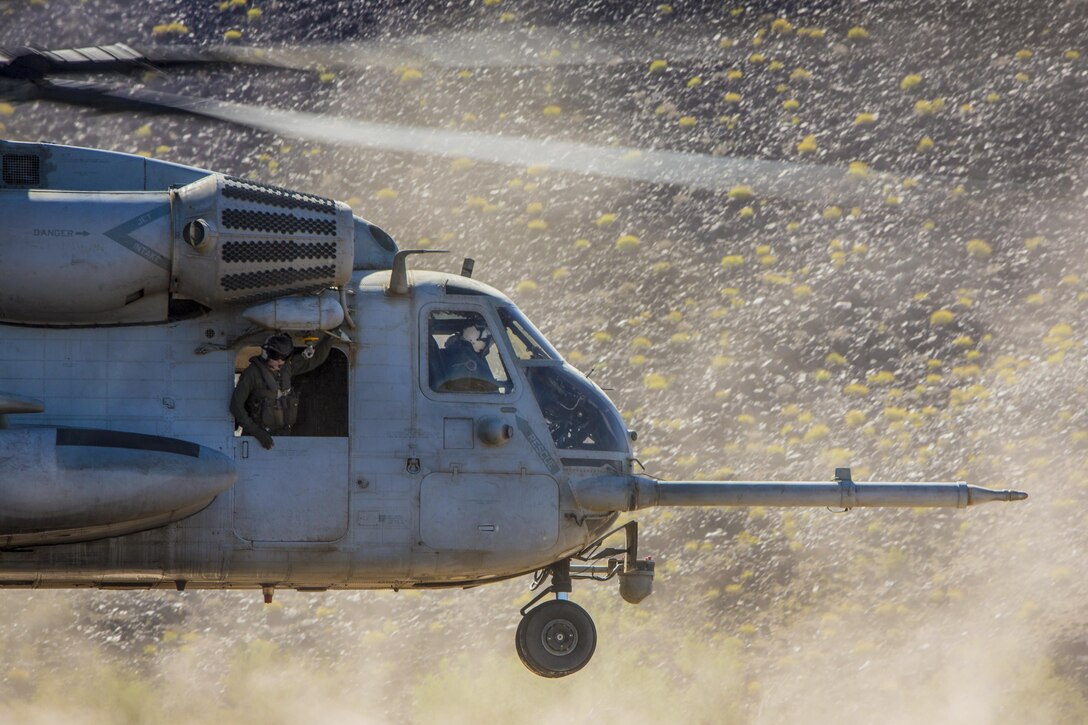 A CH-53E Super Stallion takes off during a tactical support insert and extract exercise as part of a weapons and tactics course at Naval Air Facility El Centro, Calif., April 15, 2017. The biannual course gives students detailed training on various ranges in Arizona and California. The Stallion is assigned to Marine Heavy Helicopter Squadron 466. Marine Corps photo by Cpl. Trever Statz