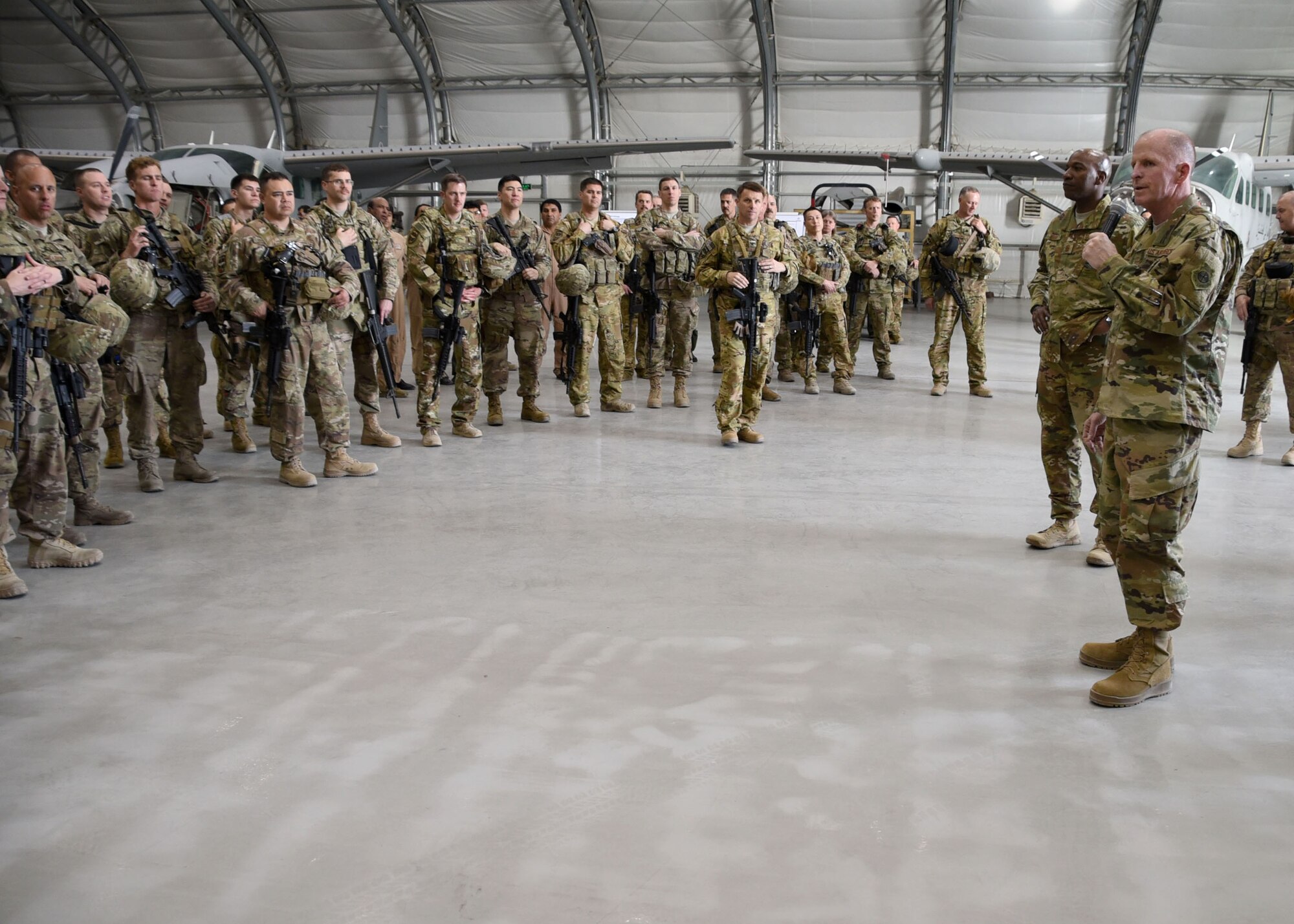 Gen. Stephen Wilson, Vice Chief of Staff of the Air Force, addresses Train, Advise, Assist Command-Air (TAAC-Air) advisors at Kabul Air Wing, Afghanistan, April 13, 2017. Wilson; Chief Master Sgt. of the Air Force Kaleth O. Wright; Maj. Gen. James Hecker, 9th Air and Space Expeditionary Task Force-Afghanistan commander; and Chief Master Sgt. Lisa Arnold, 9th AETF-A command chief; visited the 438th Air Expeditionary Wing and TAAC-Air. Brig. Gen. David Hicks, 438th AEW and TAAC-Air commander, and a contingent of TAAC-Air Coalition and Afghan Air Force members gave the visitors a tour of AAF aircraft. Wilson thanked the group for their hard work and dedication to the mission. (U.S. Air Force photo by Tech. Sgt. Veronica Pierce)