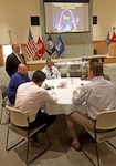 A group of employees gather during a World Café dialogue event in DLA Troop Support’s Bldg. 6 auditorium Apr. 12. The organization’s Equal Employment Opportunity and Diversity office hosted the event as an approach to strengthen diversity and inclusion. 