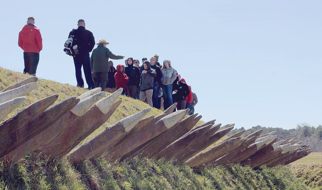 Corporals learn about Yorktown Redoubts 9 and 10, bunkers that were seized on the night of Oct. 14, 1781, by French and American infantry. Corporals were asked to listen attentively as it was here that they would make their own command orders, to compare their actions to those of their predecesors.
