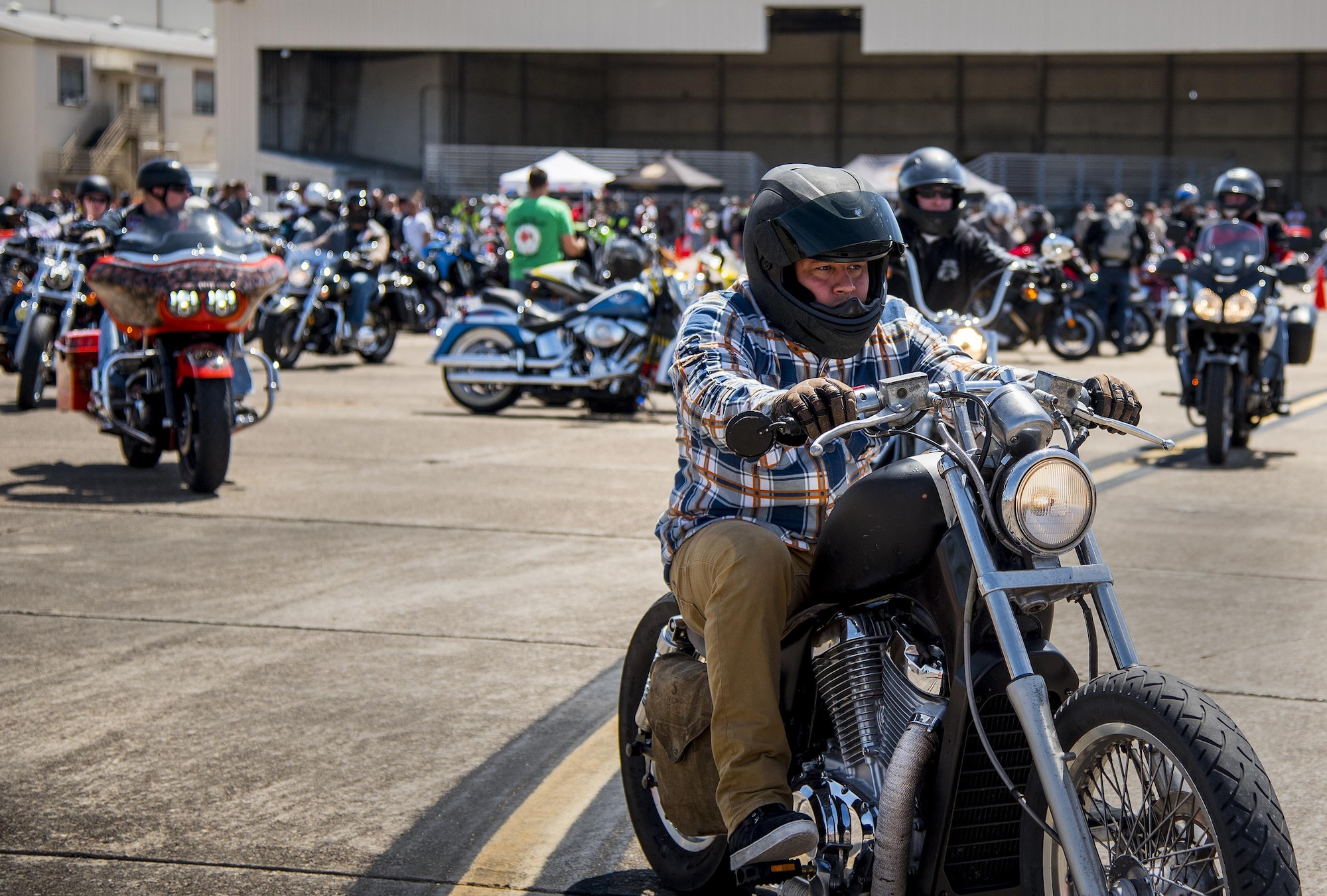 A biker rolls out after the annual motorcycle safety rally at Eglin Air Force Base, Fla., April 14.  More than 500 motorcyclists came out for the event that meets the annual safety briefing requirement for base riders.  (U.S. Air Force photo/Samuel King Jr.)