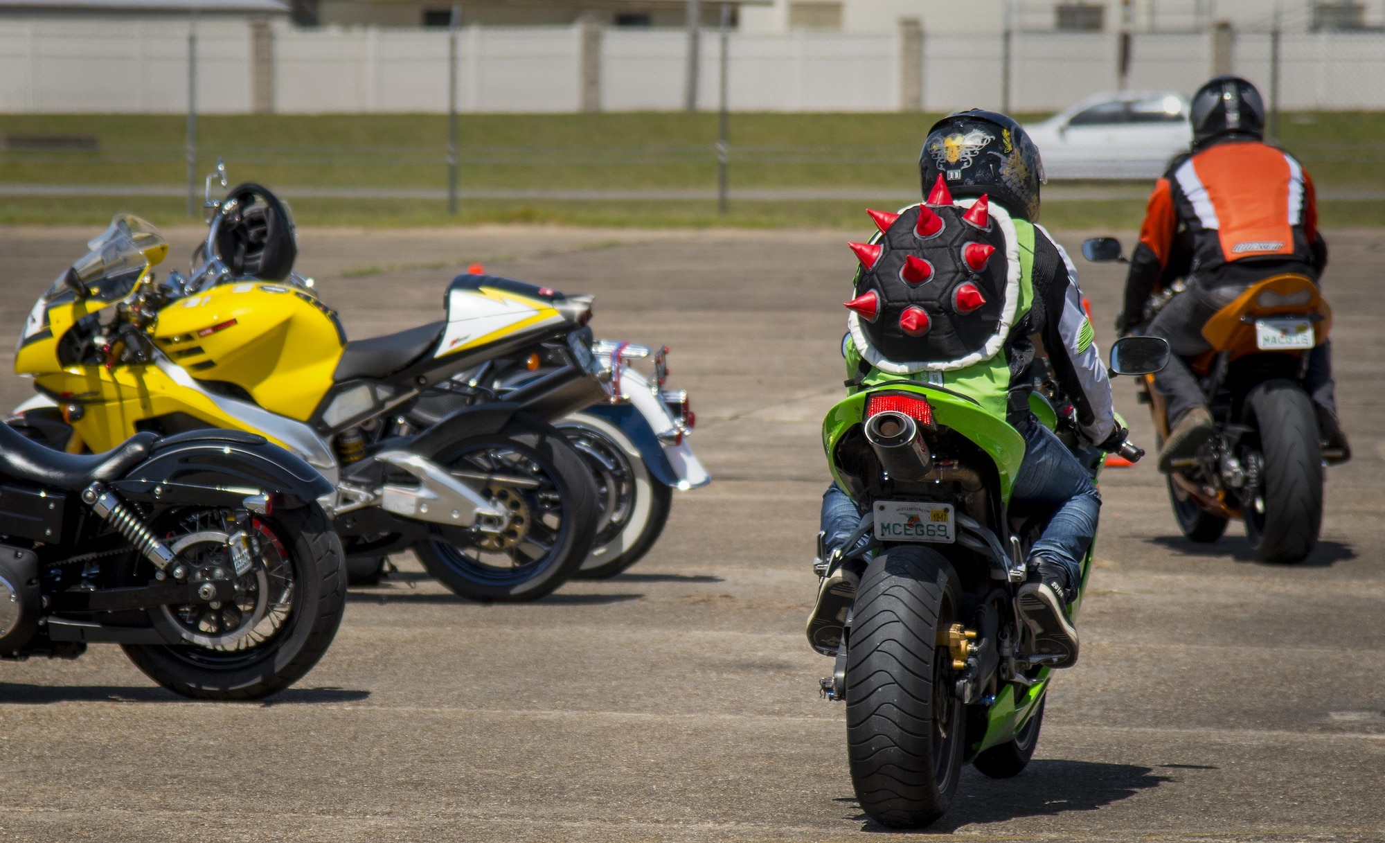 A biker rolls out after the annual motorcycle safety rally at Eglin Air Force Base, Fla., April 14.  More than 500 motorcyclists came out for the event that meets the annual safety briefing requirement for base riders.  (U.S. Air Force photo/Samuel King Jr.)