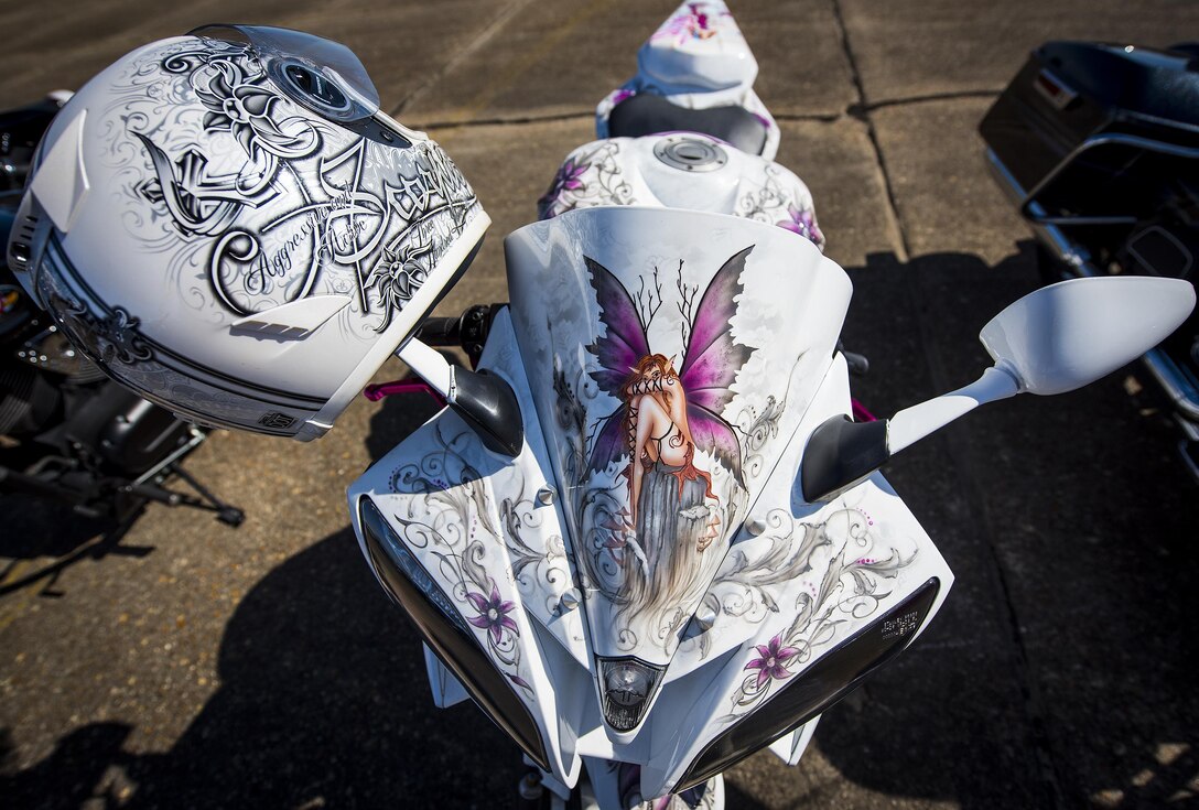 A highly-detailed paint job appears on a bike sitting in front of the hangar during the annual motorcycle safety rally at Eglin Air Force Base, Fla., April 14.  More than 500 motorcyclists came out for the event that meets the annual safety briefing requirement for base riders.  (U.S. Air Force photo/Samuel King Jr.)