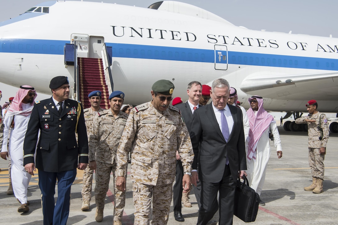 Defense Secretary Jim Mattis speaks with Army Gen. Abdulrahman bin Saleh al-Banyan, chief of Saudi Arabia's Joint Staff, after arriving at King Salman Air Base, Saudi Arabia.