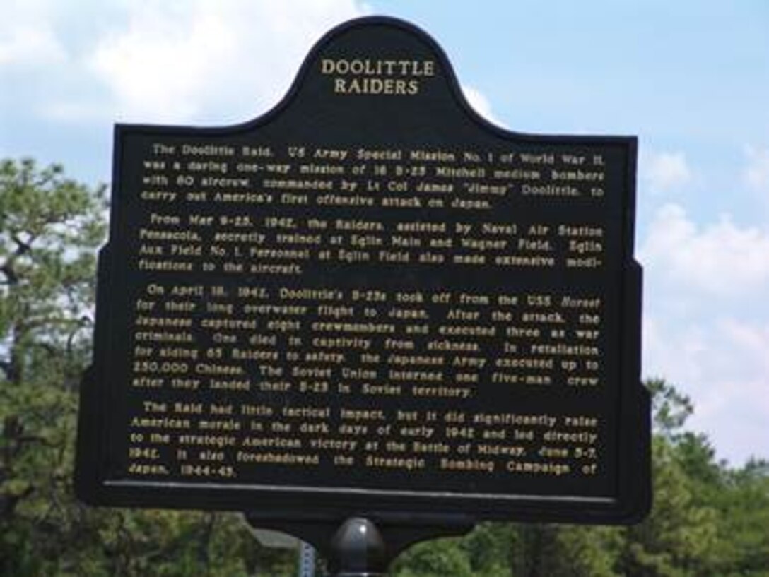 Historical marker to the Doolittle Raiders at entrance to Wagner Field, Eglin Air Force Base, Florida.  The Air Armament commander, Maj Gen David Eidsaune, dedicated this historical marker to the Doolittle Raiders at the Eglin AFB Open House on 7 April 2007 and later placed the marker at the entrance to Wagner Field (Auxiliary Field #1), one of the small airfields on Eglin AFB where the Doolittle Raiders practiced their short takeoffs.  (US Air Force photo)