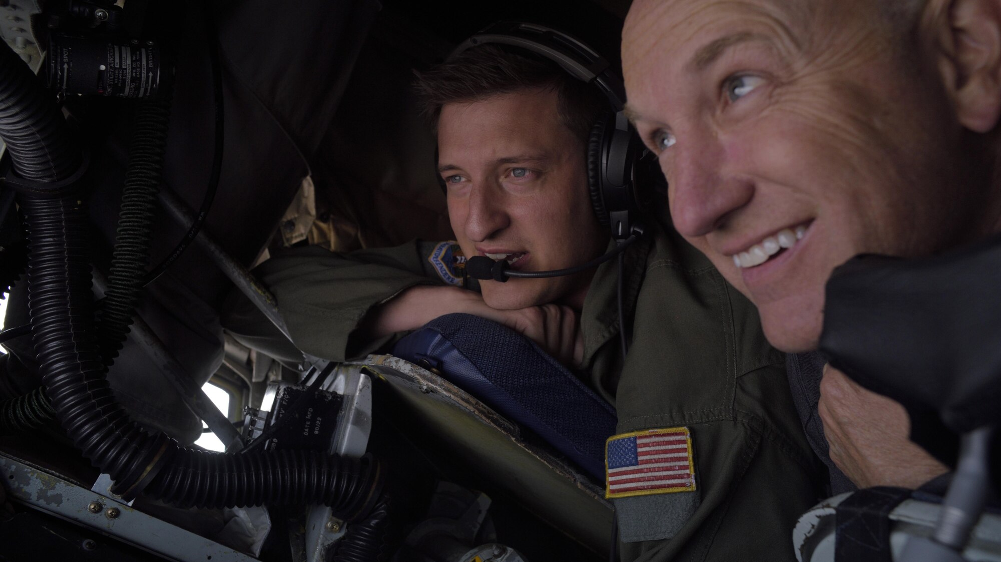 U.S. Air Force Staff Sgt. Josh Eidson, boom operator with the 91st Air Refueling Squadron, shows a Tampa Bay community leader the aerial refueling capability of the KC-135 Stratotanker aircraft during a civic leader trip to Nellis Air Force Base, Nev., April 14, 2017. Twenty-two community leaders spent two days at Nellis AFB taking a behind-the-scenes look into the future of warfare and how the KC-135 will play a key role in mobility air forces for years to come. (U.S. Air Force photo by Senior Airman Brad N. Tipton)