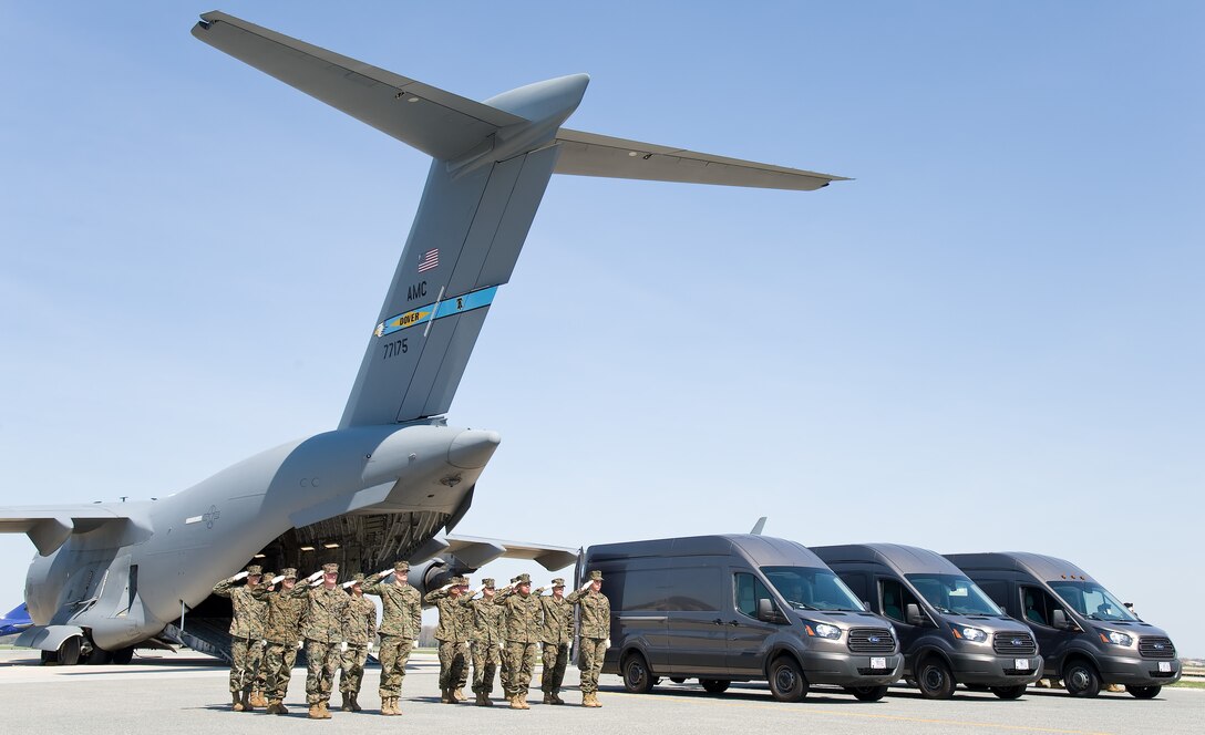 U.S. Marines render a final salute as the doors of the mortuary transfer vehicles are closed during Folded Flag 2017 April 11, 2017, on Dover Air Force Base, Del. The Marines participated in the joint service training exercise that tested the ability of the Air Force Mortuary Affairs Operations to respond to a mass casualty incident. (U.S. Air Force photo by Roland Balik)