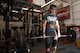 Senior Airman Benjamin Le, a services apprentice with the 136th Force Support Squadron, Texas Air National Guard, deadlifts 475 pounds at Metroflex Gym-Plano, Plano, Texas Jan. 4, 2017.  Le lifts heavy weights during his workouts to better prepare for his powerlifting meets. (Air National Guard photo by Senior Airman De'Jon Williams)