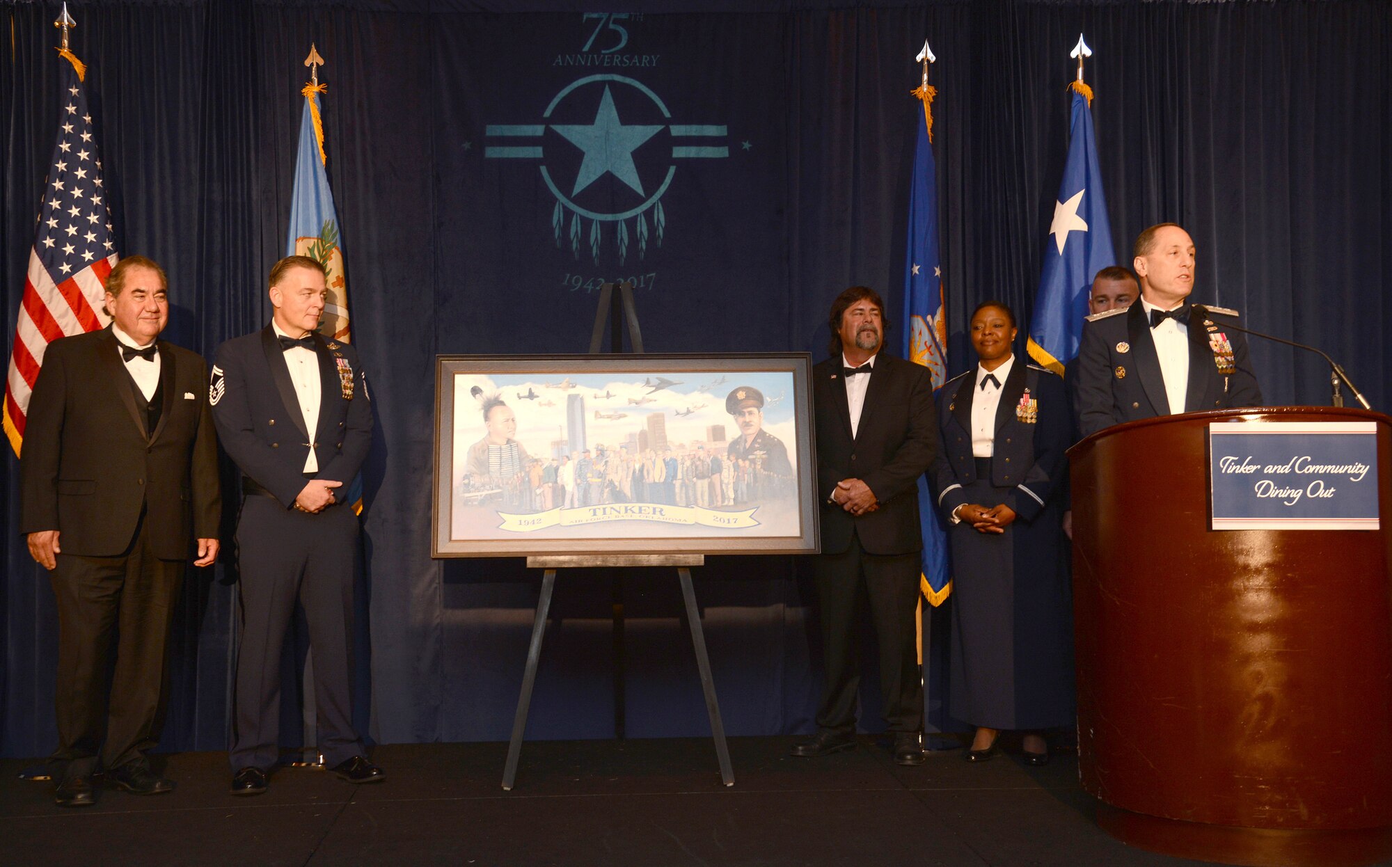 As part of Tinker's 75th Anniversary festivities, the Tinker and Community Dining Out was held at The Skirvin Hilton in downtown Oklahoma City Apr. 7. Oklahoma State Gov. Mary Fallin was the featured speaker at the black-tie event. A commissioned painting commemorating the 75th anniversary of Tinker Air Force Base, and painted by one of Tinker's own, Senior Master Sgt. Darby Perrin, with the 507th Air Refueling Wing, was unveiled during the celebration.