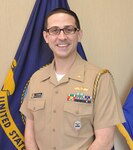 Navy Lt. Tim Vadala, , aide-de-camp or aide-to-the-Defense Logistics Agency Aviation commander is an active soccer player who enjoys family time with his wife and large cat and doesn’t sweat the small stuff in life. (Photo by Kimberly K. Fritz)