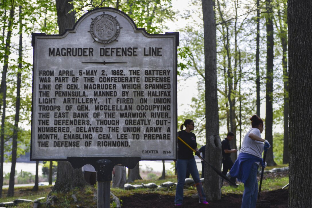 As part of Earth Week, the 733rd Civil Engineer Division organized the mulching, sandbagging, and spreading of grass seed at the Magruder Defense Line Civil War earthworks site to help prevent further erosion at Joint Base Langley-Eustis, Va., April 17, 2017. The line was a fighting position used by Confederate Soldiers to prevent Fort Monroe’s Union Soldiers from crossing the Warwick River. (U.S. Air Force photo/Tech. Sgt. Katie Gar Ward)