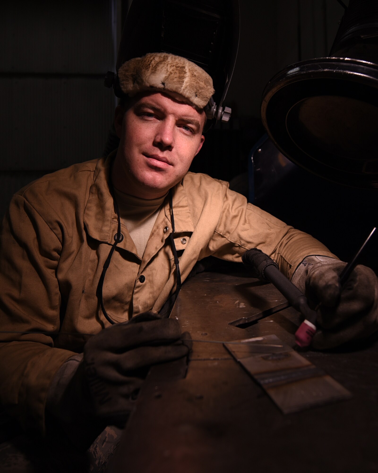 U.S. Air Force Senior Airman Andrew Herrick, 19th Maintenance Squadron Aircraft Metals Technology journeyman, supports the Combat Airlift mission by welding and manufacturing aircraft parts. The metals tech Airmen are responsible for repairing and manufacturing essential aircraft components and flight line equipment using welding and milling machines. (U.S. Air Force photo by Airman 1st Class Kevin Sommer Giron)
