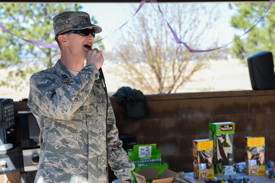 Chaplain (Capt.) Portmann Werner, 50th Space Wing chaplain, discusses the rules of engagement for the 2nd Annual Easter Egg Hunt hosted by the chaplains’ office at Schriever Air Force Base, Colorado, Wednesday, April 12, 2017.  Werner allowed for "slight contact" through the competition as Airmen competed for the 12 golden eggs among the 1,400 eggs hidden.  (U.S. Air Force photo/Christopher DeWitt)