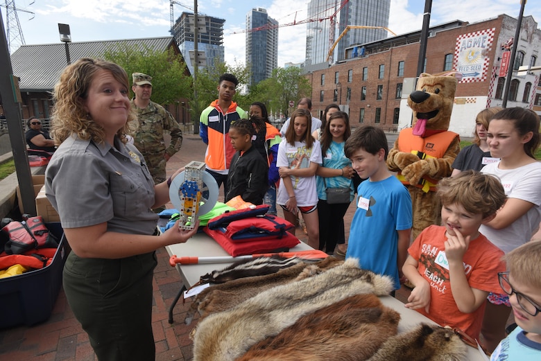 Cordell Hull Lake Park Ranger Ashley Webster gives a presentation on hydropower, water safety and natural resources to kids participating in the district’s “Take Your Kids to Work Day” activities at Riverfront in Nashville, Tenn., April 14, 2017.