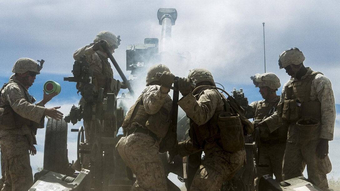 U.S. Marines with Battery B, 1st Battalion, 10th Marine Regiment, reload the M777 towed 155 mm howitzer during the assault support tactics 1 exercise in support of Weapons and Tactics Instructors course 2-17 at Fire Base Burt, Calif., April 17, 2017. AST-1 is a battalion reinforced air assault exercise, supported by fixed wing and rotary wing aviation fires, aviation delivered artillery, and mortars. WTI is a seven-week training event hosted by Marine Aviation Weapons and Tactics Squadron One cadre, which emphasizes operational integration of the six functions of Marine Corps aviation in support of a Marine Air Ground Task Force and provides standardized advanced tactical training and certification of unit instructor qualifications to support Marine Aviation Training and Readiness and assists in developing and employing aviation weapons and tactics.