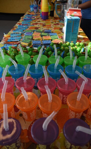 Smoothies and toys sit on display at Schriever Air Force Base, Colorado, Friday, April 14, 2017. The Child Development Center and Sexual Assault Prevention and Response staff coordinated a smoothie bar event to show appreciation for military kids and parents during Month of the Military Child. (U.S. Air Force photo/Senior Airman Arielle Vasquez)