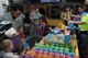 Schriever members and military kids line up for smoothies at Schriever Air Force Base, Colorado, Friday, April 14, 2017. This marked the fourth consecutive year a smoothie bar was set up at the Child Development Center during the Month of the Military Child. (U.S. Air Force photo/Senior Airman Arielle Vasquez)